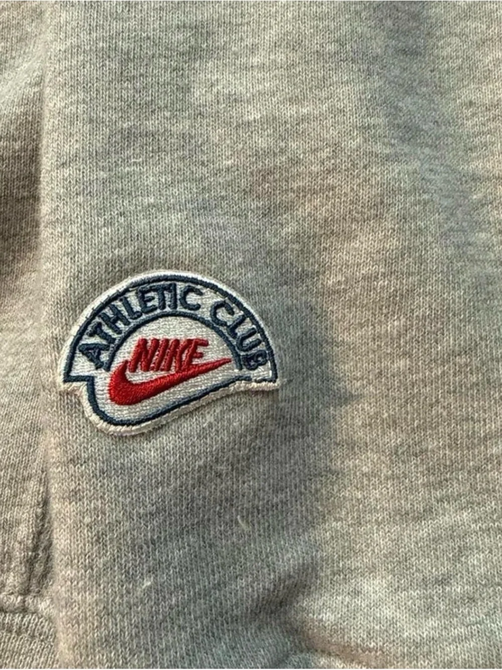 Nike Gray Crewneck Sweatshirt with Blue 'Nike Athletic Club' Logo and Red Swoosh